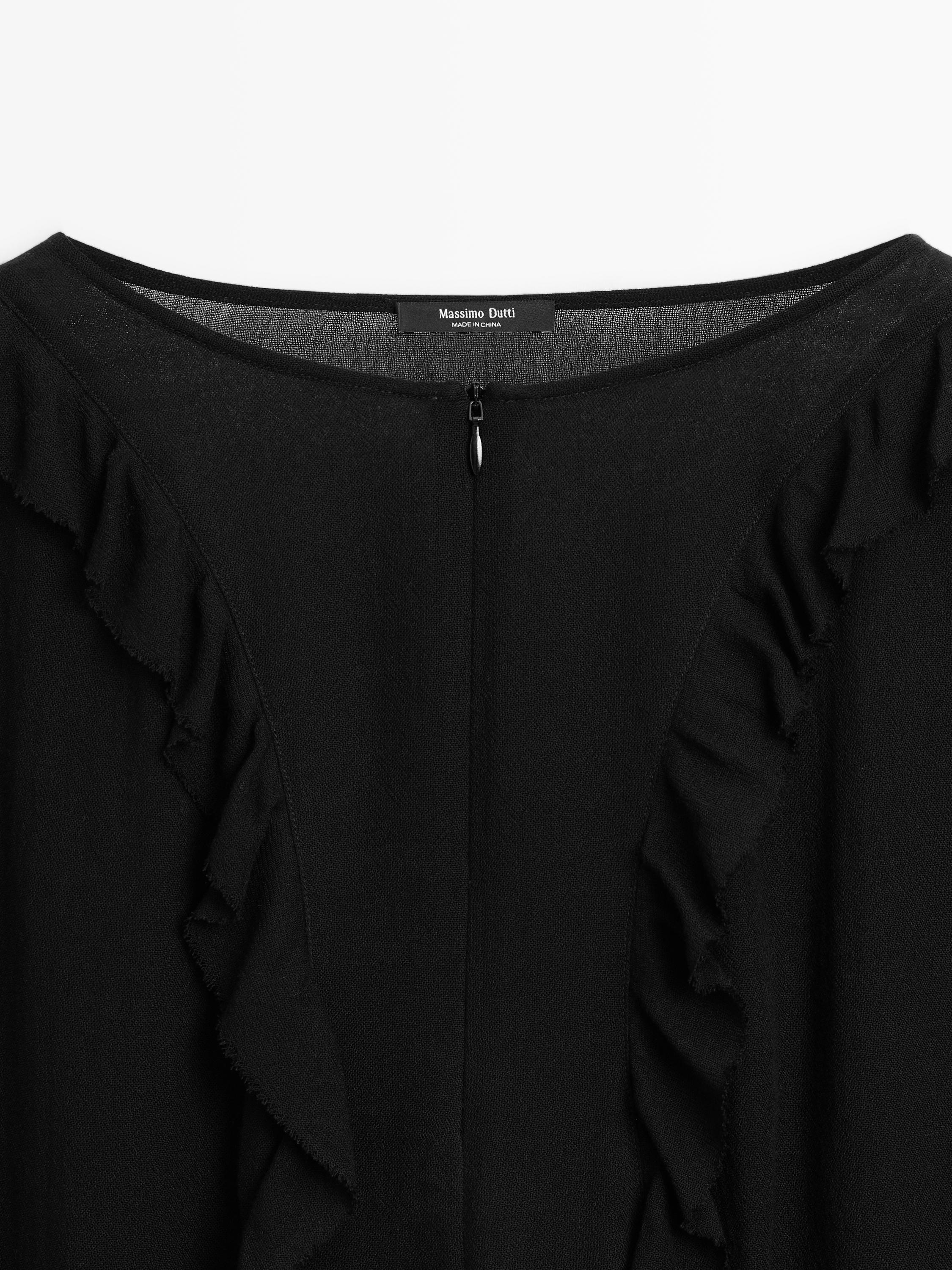 Blouse fluide à volants et fermeture Éclair